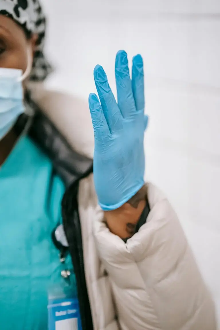 nurse using her gloves